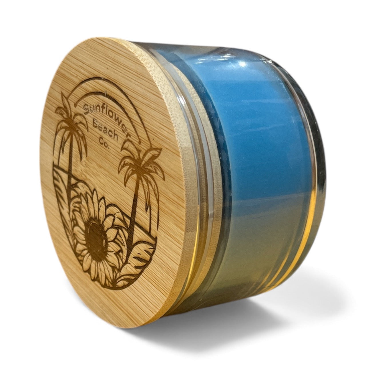Jar with wooden lid featuring sunflower and palm tree design on a white background